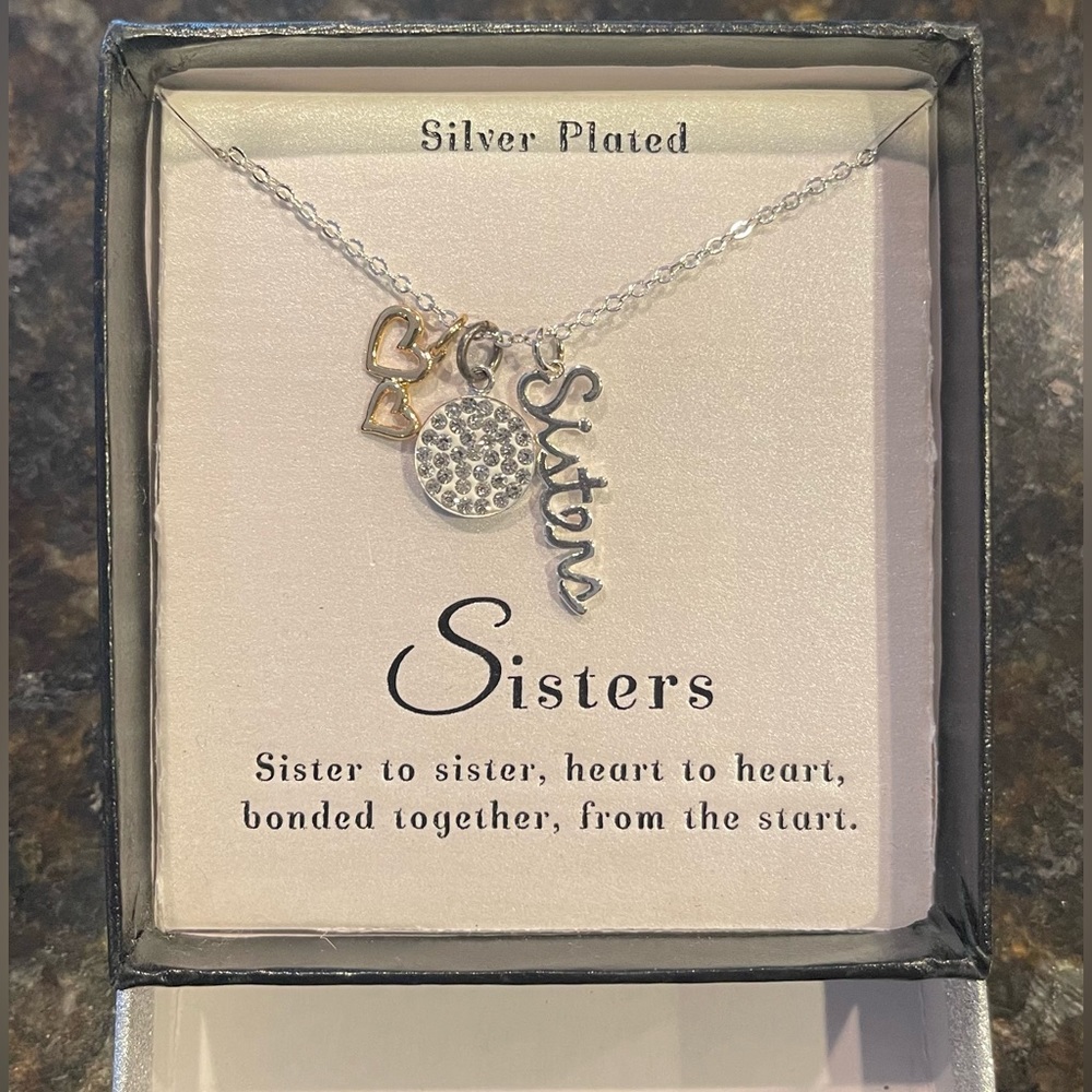 Sisters necklace. Three charms. Silver plated. NWT